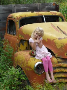 Kateri on an abandoned truck in Old town