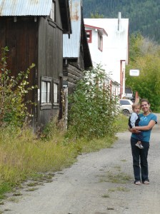 Denise and Isaiah. The Riversong restaurant and lodge are behind to the right