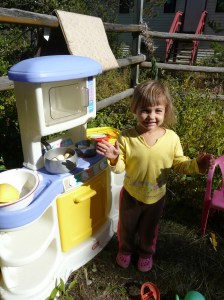 Gianna playing house in our front yard