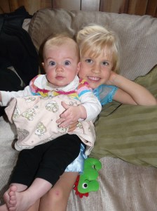 Kateri loves to hold Aliz!